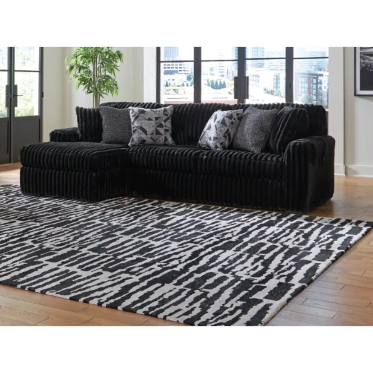 Ashley Midnight Madness Sofa with Chaise in Onyx Signature Design by Ashley