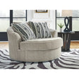 Ashley Calnita Swivel Accent Chair in Sisal Signature Design by Ashley